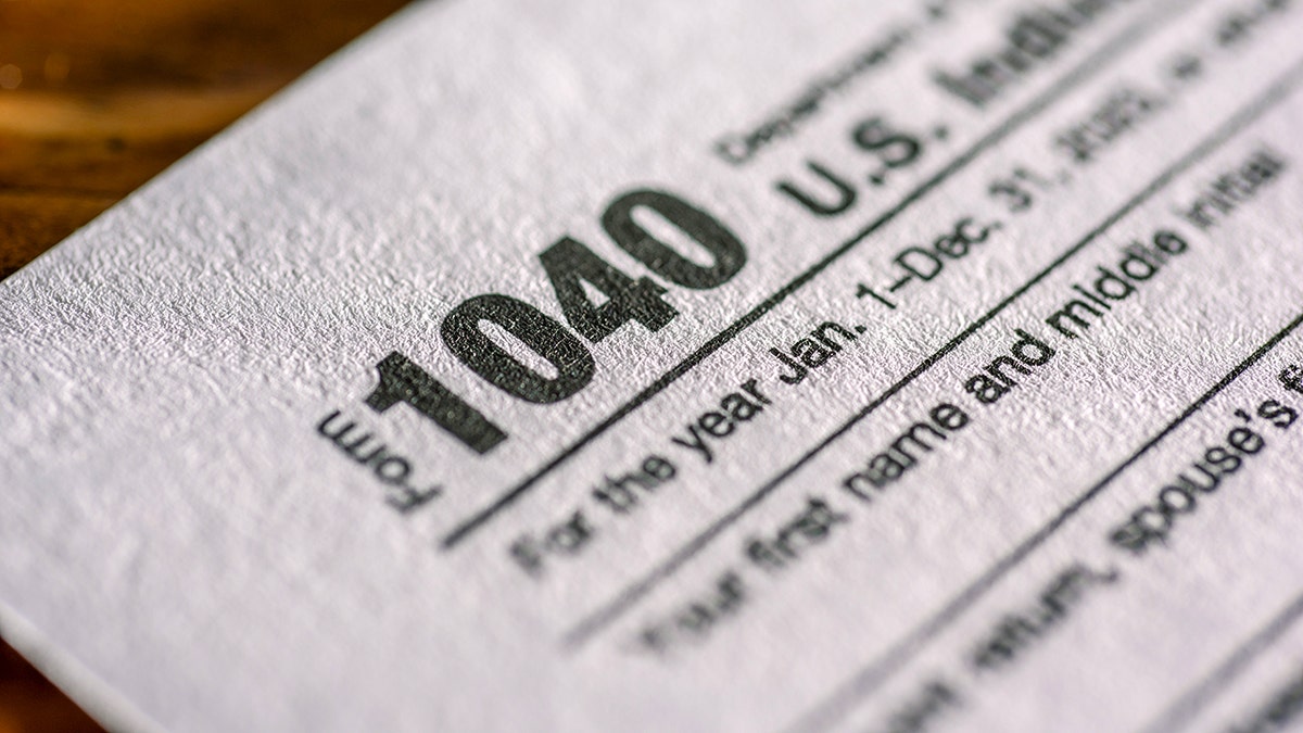 1040 tax form on a table.